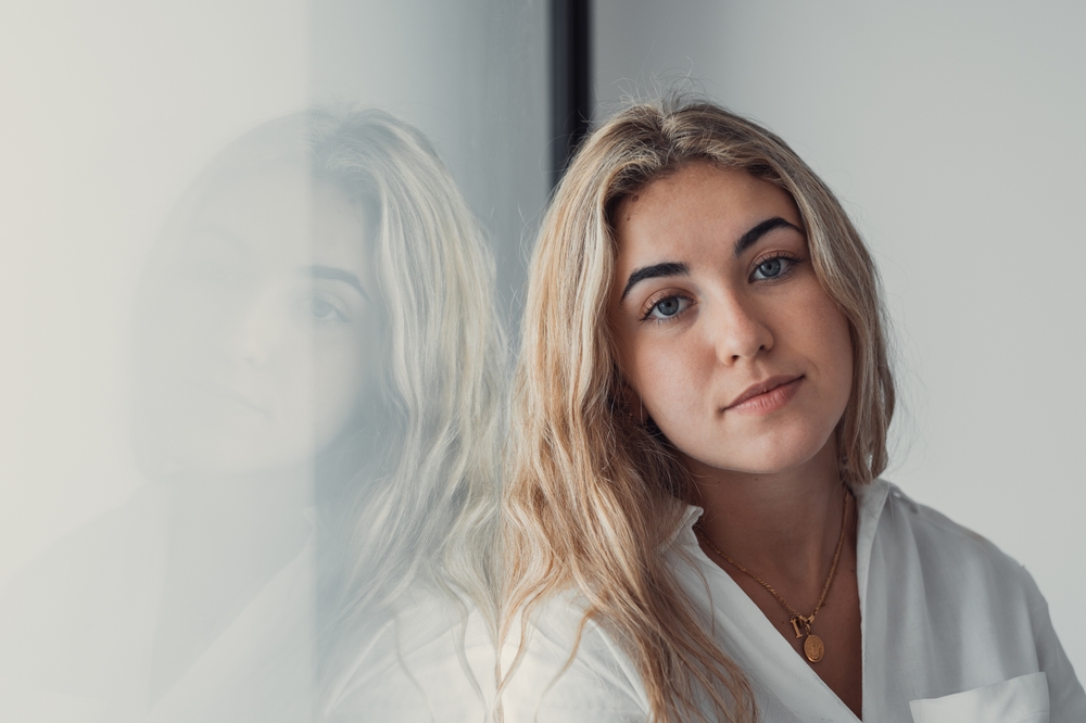 confident young woman looking at the camera